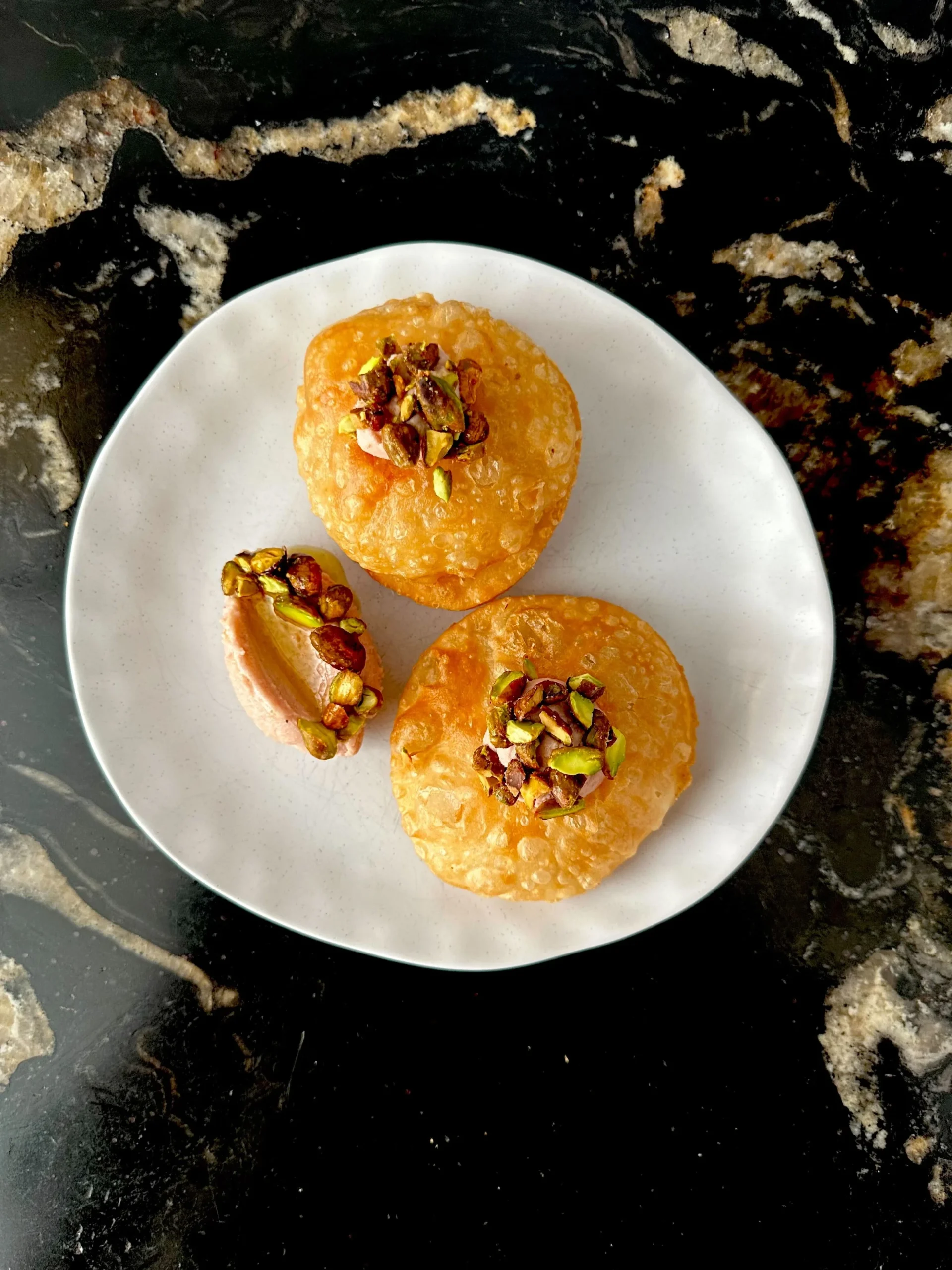 Golden Sicilian pastry bites with pistachio